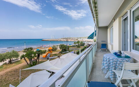 Massimo Beach House: Cloud, Sky, Plant, Arecales, Shade, Tree, Coastal And Oceanic Landforms, Leisure, Terrestrial Plant, Boat