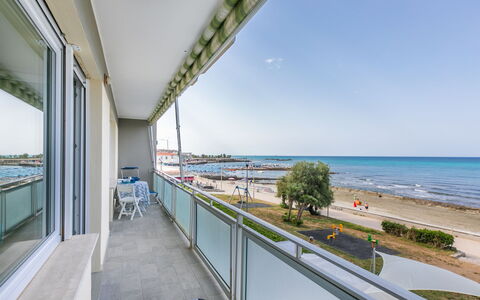 Massimo Beach House: Cloud, Sky, Plant, Arecales, Shade, Tree, Coastal And Oceanic Landforms, Leisure, Terrestrial Plant, Boat