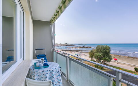 Massimo Beach House: Cloud, Sky, Plant, Arecales, Shade, Tree, Coastal And Oceanic Landforms, Leisure, Terrestrial Plant, Boat