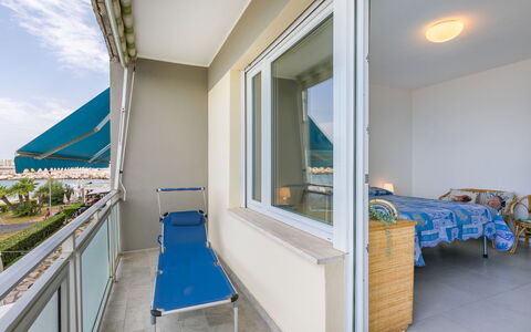 Massimo Beach House: Cloud, Sky, Plant, Arecales, Shade, Tree, Coastal And Oceanic Landforms, Leisure, Terrestrial Plant, Boat