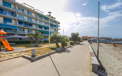 Massimo Beach House: Cloud, Sky, Plant, Arecales, Shade, Tree, Coastal And Oceanic Landforms, Leisure, Terrestrial Plant, Boat