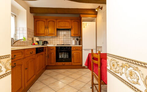 Emeraude: Cabinetry, Property, Countertop, Wood, Kitchen, Kitchen Stove, Interior Design, Architecture, Wood Stain, Kitchen Appliance