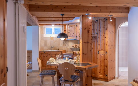 Chesa Anemona al Lej: Property, Furniture, Table, Wood, Building, Interior Design, Floor, Wood Stain, Beam, Flooring