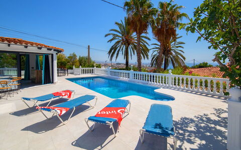 Estrella Azul: Sky, Property, Swimming Pool, Azure, Water, Outdoor Furniture, Plant, Shade, Building, Tree