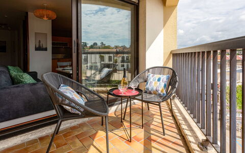 Le Continental: Property, Furniture, Sky, Table, Wood, Interior Design, Architecture, Chair, Shade, Building