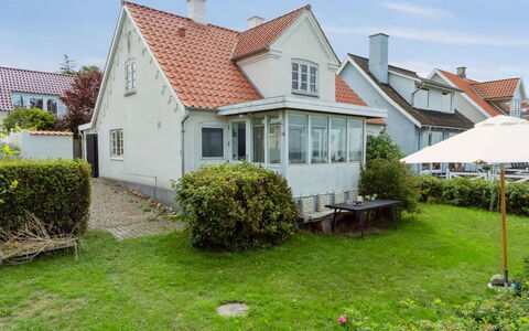 Merete - 50M from the Sea: Roof, House, Home, Cottage, Siding, Estate, Driveway, Garden Buildings, Yard, Shed