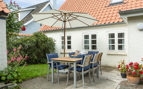 Merete - 50M from the Sea: Roof, House, Home, Cottage, Siding, Estate, Driveway, Garden Buildings, Yard, Shed