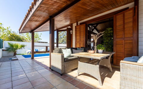 Tropical 2: Furniture, Flooring, Floor, Wood, Chair, Table, Outdoor Furniture, Wood Flooring, Porch, Hardwood