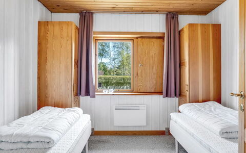 Hakon - 550M from the Sea: Wood, Interior Design, Floor, Flooring, Bedroom, Bed, Room, Ceiling, Bedding, Hardwood