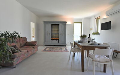 Sabbia Alpina 900.2: Furniture, Plant, Couch, Table, Building, Wood, Houseplant, Hall, Living Room, Flooring