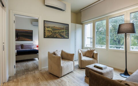 Betty Florence Charming Modern Apartment Near Piaz: Couch, Property, Furniture, Comfort, Table, Window, Wood, Interior Design, Flooring, Picture Frame