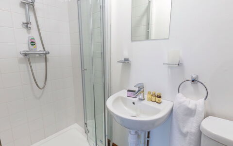 Beech: Mirror, Tap, Plumbing Fixture, Sink, Bathroom Sink, Shower Head, Bathroom, Shower Panel, Shower Bar, Purple