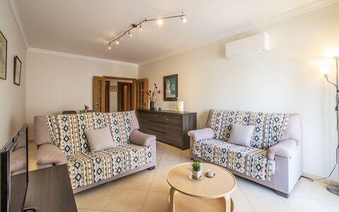 Sunny Beach Treasure: Couch, Furniture, Table, Property, Lighting, Living Room, Interior Design, Decoration, Flooring, Floor