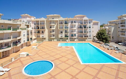 Sunny Beach Treasure: Water, Property, Sky, Window, Building, Azure, Swimming Pool, Urban Design, House, Condominium