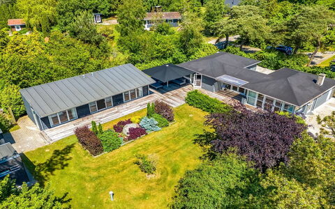 Rother - 50M from the Sea: Roof, Home, Door, Cottage, Shade, Siding, Yard, Estate, Backyard
