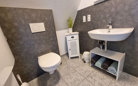 Marie: Plumbing Fixture, Tap, Plant, Bathroom, Bathroom Sink, Toilet, Purple, Sink, Bathtub, Wood