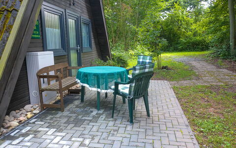 Marie: Plant, Property, Table, Tree, Chair, Road Surface, Shade, Outdoor Table, Outdoor Furniture, Window