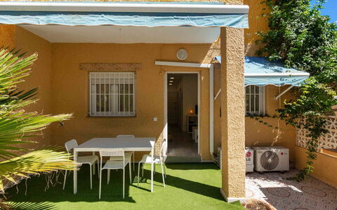 Elena: Plant, Property, Building, Furniture, Chair, Shade, Tree, Interior Design, Window, House
