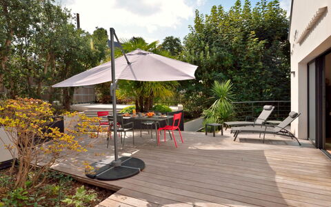 Villa la Rose des Sables: Plant, Furniture, Sky, Cloud, Umbrella, Shade, Table, Outdoor Furniture, Building, Tree
