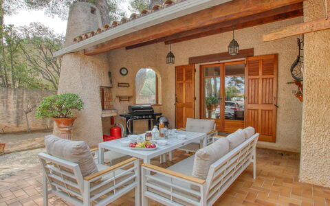 L'Arbousier: Furniture, Plant, Property, Table, Building, Flowerpot, Chair, Door, Interior Design, Wood