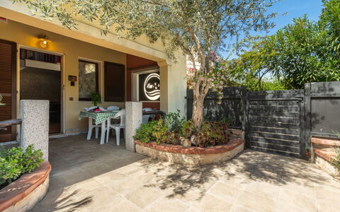 Villasimius 683: Plant, Property, Building, Architecture, Shade, Road Surface, Tree, Residential Area, Neighbourhood, Landscape