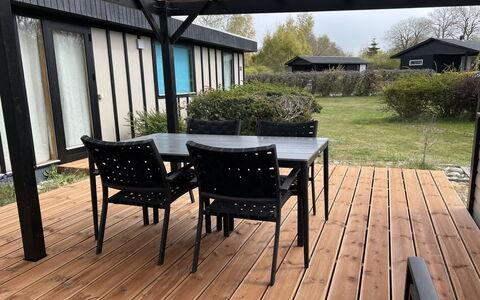 Morten - 120M from the Sea: Roof, Home, Door, Cottage, Shade, Siding, Yard, Estate, Backyard