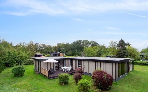Morten - 120M from the Sea: Roof, Home, Door, Cottage, Shade, Siding, Yard, Estate, Backyard