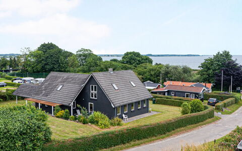Cajsa - 200M from the Sea: Roof, House, Home, Cottage, Siding, Estate, Driveway, Garden Buildings, Yard, Shed