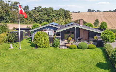 Kerstin - 400M from the Sea: Roof, Home, Door, Cottage, Shade, Siding, Yard, Estate, Backyard