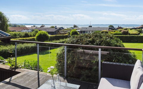 Kerstin - 400M from the Sea: Roof, Home, Door, Cottage, Shade, Siding, Yard, Estate, Backyard