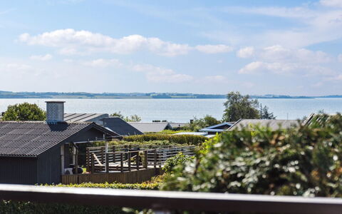 Kerstin - 400M from the Sea: Roof, Home, Door, Cottage, Shade, Siding, Yard, Estate, Backyard