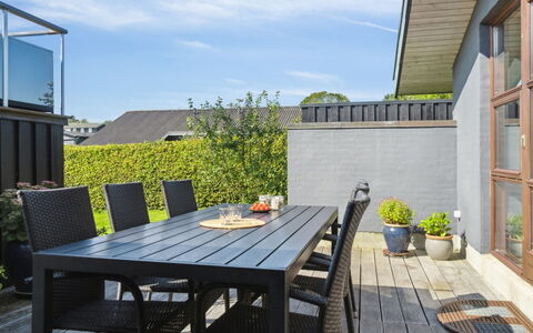 Kerstin - 400M from the Sea: Roof, Home, Door, Cottage, Shade, Siding, Yard, Estate, Backyard