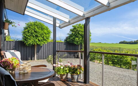 Kerstin - 400M from the Sea: Roof, Home, Door, Cottage, Shade, Siding, Yard, Estate, Backyard