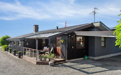 Kerstin - 400M from the Sea: Roof, Home, Door, Cottage, Shade, Siding, Yard, Estate, Backyard