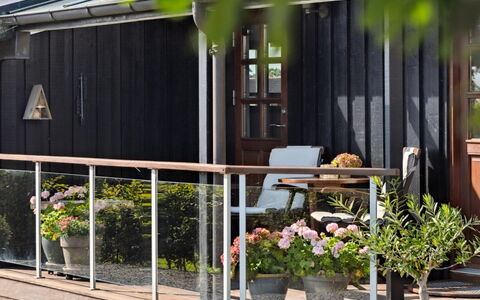 Kerstin - 400M from the Sea: Roof, Home, Door, Cottage, Shade, Siding, Yard, Estate, Backyard