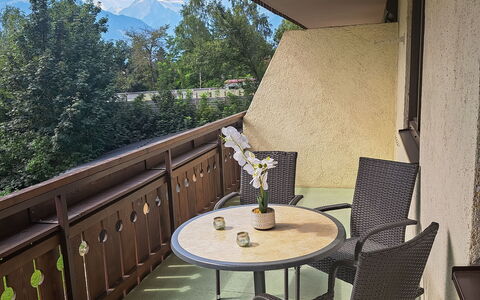 Kitzblick: Table, Furniture, Plant, Building, Flowerpot, Chair, Houseplant, Tree, Wood, Interior Design