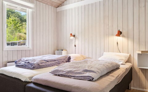 Henryk - 350M from the Sea: Bedroom, Bed, Bed Sheet, Wood, Bedding, Interior Design, Ceiling, Floor, Furniture, Bed Frame