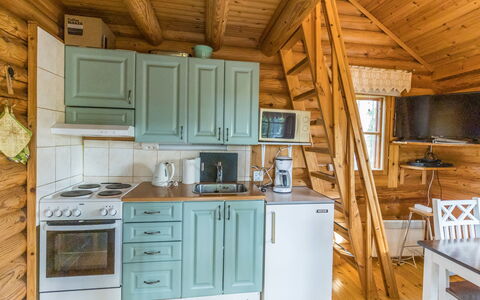 Kuukkelin Tupa 1: Wood, Flooring, Furniture, Floor, Wood Stain, Log Cabin, Hardwood, Ceiling, Cottage, Kitchen