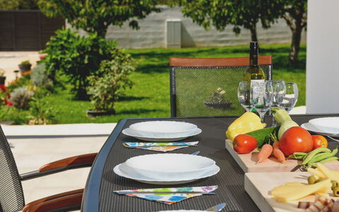 Anima: Food, Plant, Tableware, Table, Bottle, Outdoor Furniture, Tree, Plate, Grass, Fruit