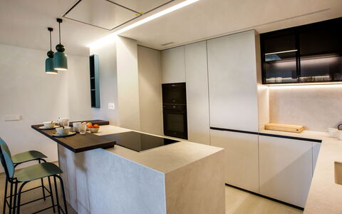 Playa Grande: Cabinetry, Kitchen, Building, Wood, Lighting, Chair, Architecture, Interior Design, Flooring, Floor