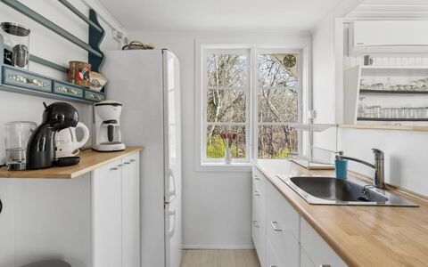 Lucie - 50M from the Sea: Kitchen, Countertop, Kitchen Appliance, Cabinetry, Interior Design, Wood, Major Appliance, Flooring, Furniture, Home Appliance
