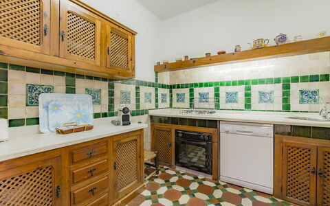 Carmen del Agua: Cabinetry, Property, Kitchen, Interior Design, Architecture, Flooring, Wood, Yellow, Countertop