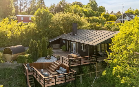Leif - 400M from the Sea: Wood, Shrub, Home, Cottage, Porch, Hardwood, Garden, Stairs, Plank, Deck