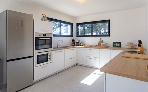 La Dune: Cabinetry, Property, Furniture, Countertop, Kitchen, Sink, Wood, Tap, Houseplant, Building