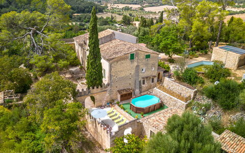 Sa Bisbal: Building, Tree, Land Lot, Vegetation, Plant, Urban Design, House, Landscape, Residential Area, Real Estate