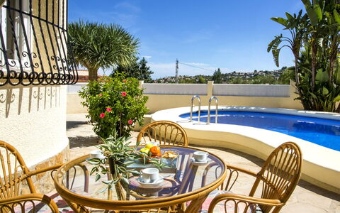 Villa Passera: Sky, Water, Property, Furniture, Plant, Table, Azure, Chair, Building, Outdoor Furniture