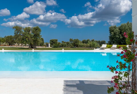 Masseria Isaia: Water, Sky, Cloud, Plant, Property, Swimming Pool, Blue, Azure, Tree, Outdoor Furniture