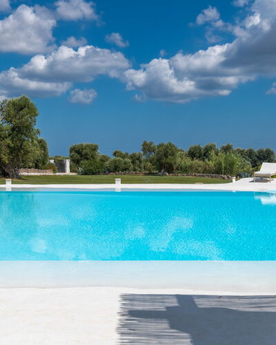 Masseria Isaia: Water, Sky, Cloud, Plant, Property, Swimming Pool, Blue, Azure, Tree, Outdoor Furniture