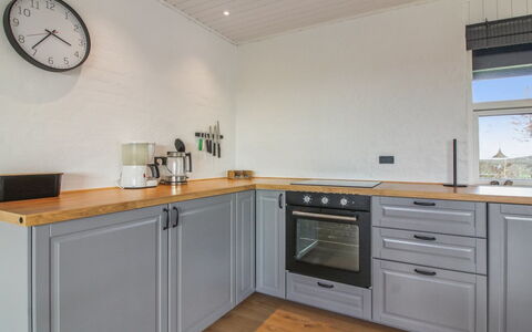 Skyler - 400M from the Sea: Flooring, Cabinetry, Wood, Kitchen, Countertop, Interior Design, Floor, Kitchen Appliance, Drawer, Furniture