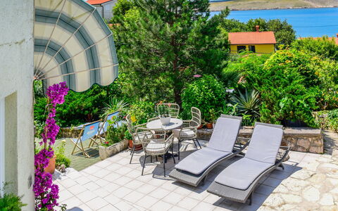 Crikvenica Jadranovo 180: Plant, Property, Sky, Flower, Building, Outdoor Furniture, Architecture, Chair, Shade, Cloud